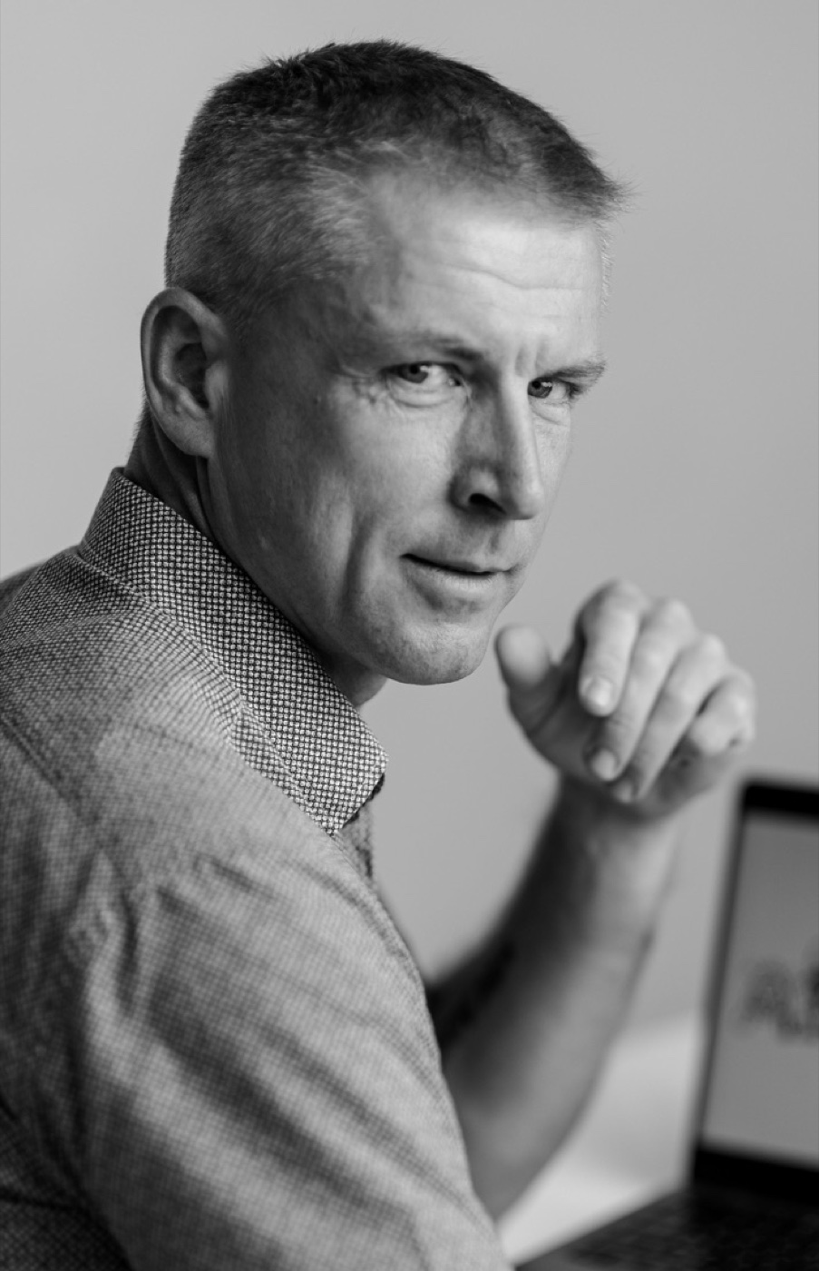 Oleksii Sologub — Strategic Advisor in Premium IOL Adoption Black-and-white portrait of Oleksii Sologub